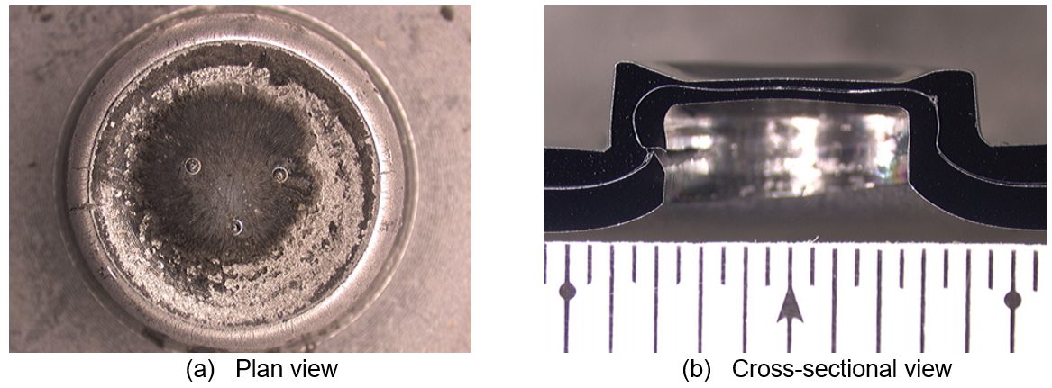 Figure 3: Clinch joint from DP 980-MPa steel showing tears on the die side.